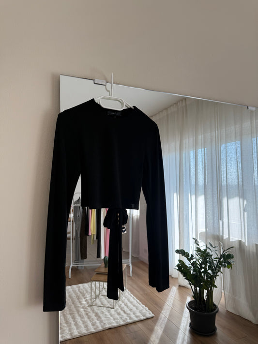 Top Lumina scollo e fiocco